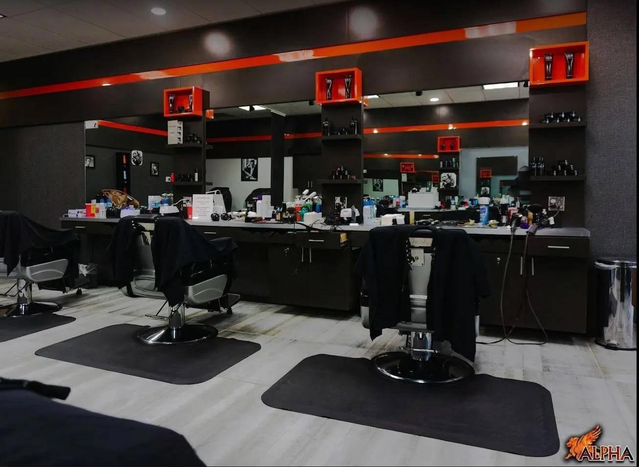 Modern barber stations inside an ALPHA Men's Spa® location